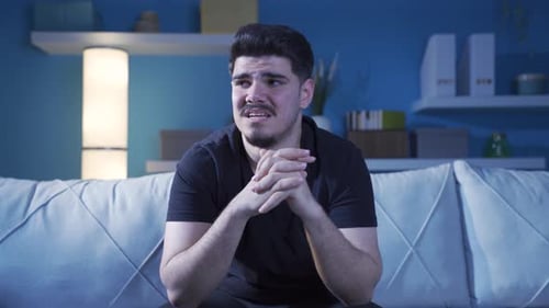 Young man with anxiety disorder is thoughtful.