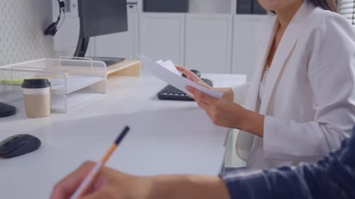 Close up of young businessman and businesswoman people work in office.