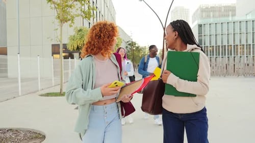 Cheerful Students Walking Together on College Campus