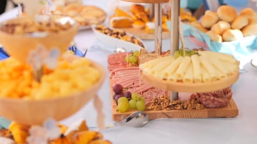 Assorted Pastries and Breads Displayed on a Decorated Table