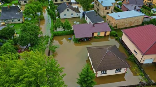 Flooded houses in a residential area after a heavy storm. Aerial view