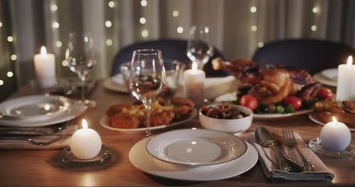 Thanksgiving Holiday Table with Turkey in the Center of the Table