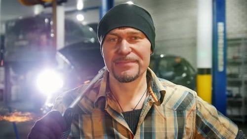 Car Service Mechanic Man Standing By the Car