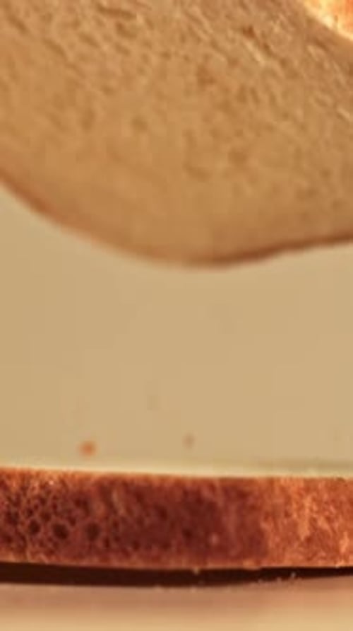 Pieces of Bread Fall on the Table Filmed on a Highspeed Camera at 1000 Fps