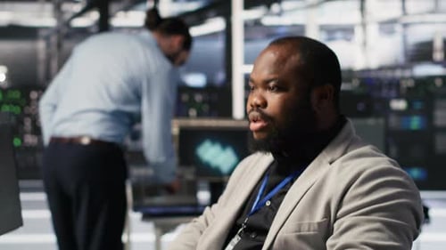 Satisfied Data Center Employee Finishing System Maintenance on Supercomputers
