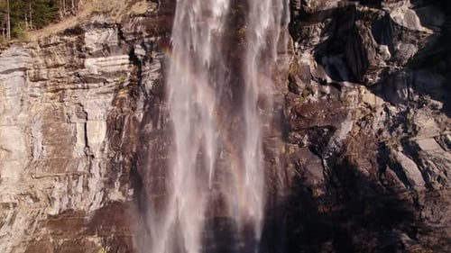 Majestic Waterfall Cascading Down Rocky Cliffside