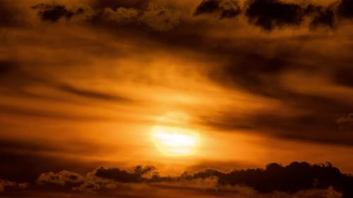 Majestic Sunset Time-Lapse with Orange Clouds