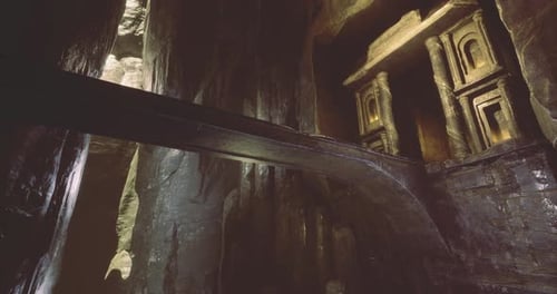 Exploring Ancient Rock Formations and Intricate Carvings in a Cavern
