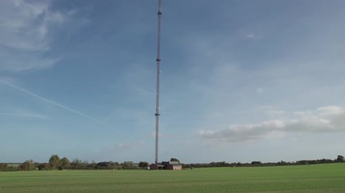 Communication Tower on Field, Cellphone Coverage GSM 5G - Truck Shot