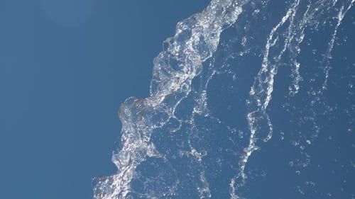 Water Pours Against The Sky