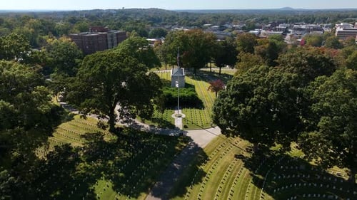 Aerial pullback reveals National Cemetery of US military veterans.