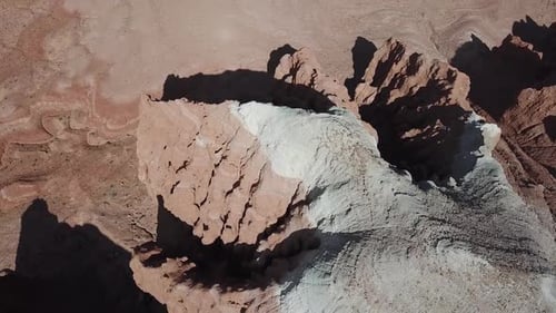 Birdseye Aerial View of Layered Steep Sandstone Cliff in Goblin Valley State Park, Utah USA