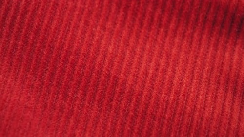 Close-Up of Red Corduroy Fabric Texture