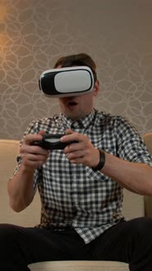 Young Adult Playing Video Games in Virtual Reality