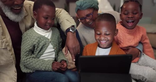 Grandparents and Children Using Tablet Together