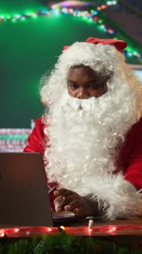 Vertical Video African American Father Christmas Navigating Web Checking on Children Wish Lists
