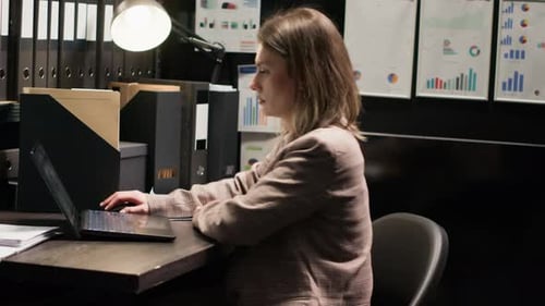 Focused Woman Working in Modern Office