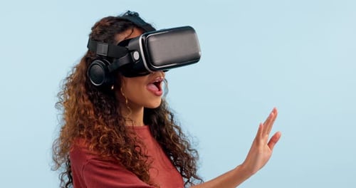 Woman, virtual reality glasses and studio with hands, gaming and press with 3D user experience by