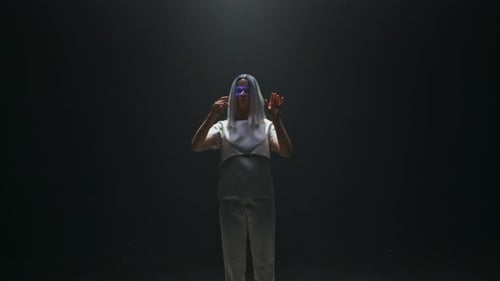 Woman Wearing Augmented Reality Glasses Interacting with Interface