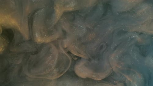 Abstract Shimmering Gold and Gray Ink Motion Background