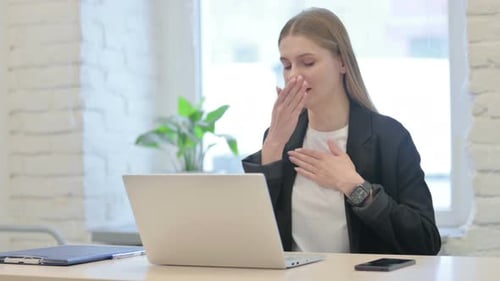 Woman Working at Laptop Becoming Sick at Desk