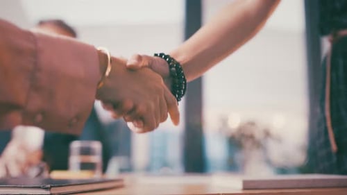 Business People Handshake Agreement in Modern Office