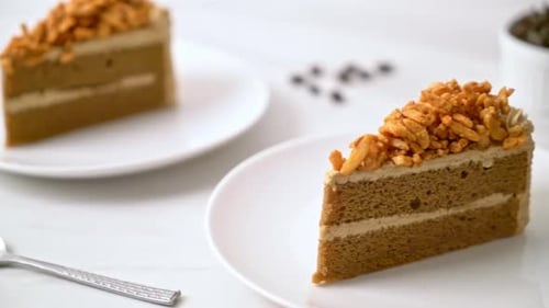 homemade coffee almonds cake on white plate