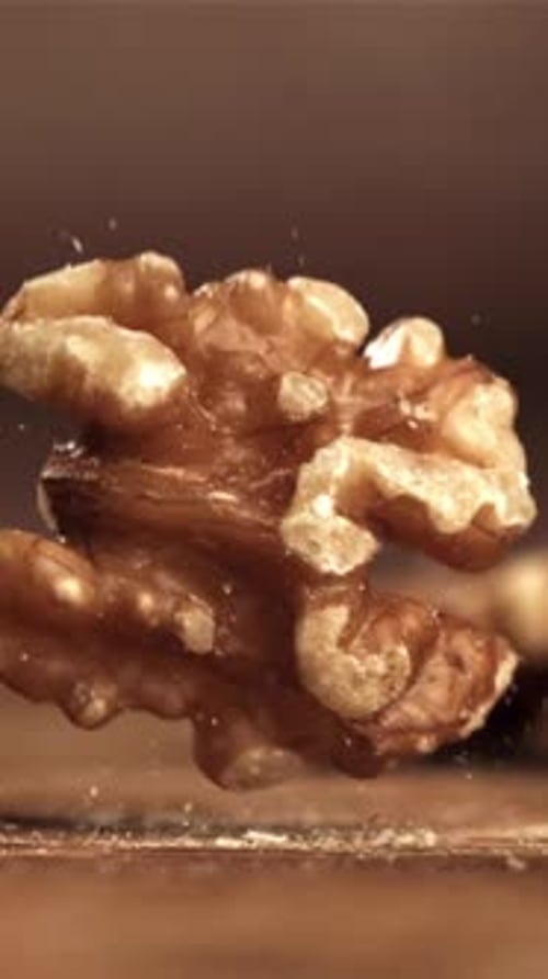 Walnuts Fall on the Table Filmed on a Highspeed Camera at 1000 Fps