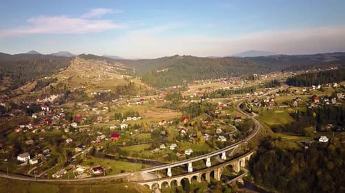 Aerial View of Autumn Mountain Landscape with Town of Vorokhta in Carpathian Mountains Ukraine