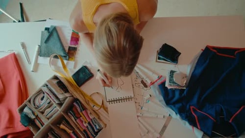 Woman Work on DIY Hobby Sewing Project in Studio