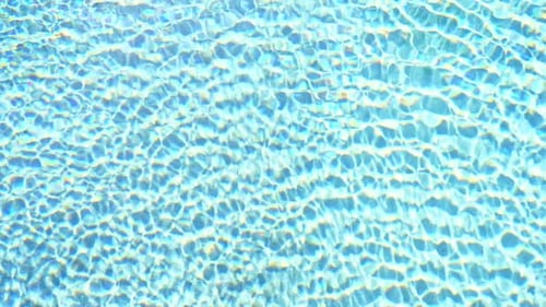 Water Surface of Blue Swimming pool, Pool water ripples at afternoon