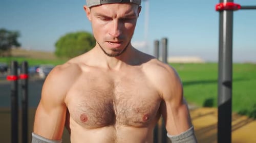 Man During Workout in Outdoor Fitness Area