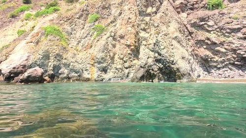 Sea Water Surface Background Low Angle View From Kayak Camera Flies Over the Clear Green Sea Water