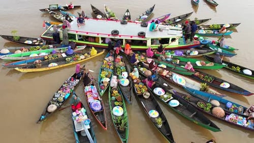 Floating Market Tradition, Early Morning Commerce on the Barito River, Banjarmasin, Indonesia