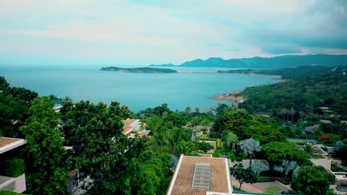 Villas on green mountain ridge. Majestic drone view of luxury villas located on green mountain range