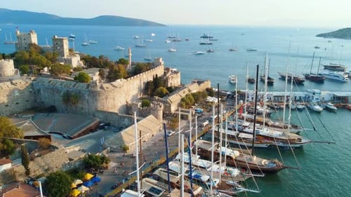 Bodrum Castle with beautiful blue sea and coastline. Sunset in yacht port Castle