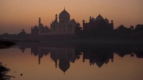 Astonishing Sunrise at Taj Mahal and reflection of it in water, Agra