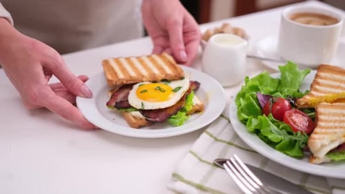 Plating Fresh Breakfast Sandwich with Salad and Coffee