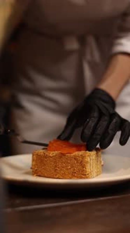 Pastry chef prepares delicious desserts at the restaurant