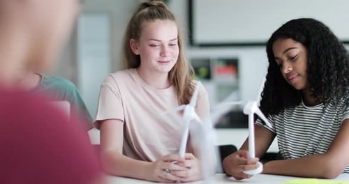 High school students studying renewable energy