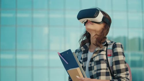Student Girl Wearing VR Headsets on Background of University