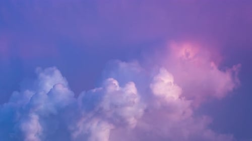 Colorful Clouds Floating in a Purple Sky
