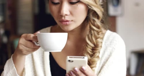 Asian woman, coffee and smartphone for social media, search internet and reading online