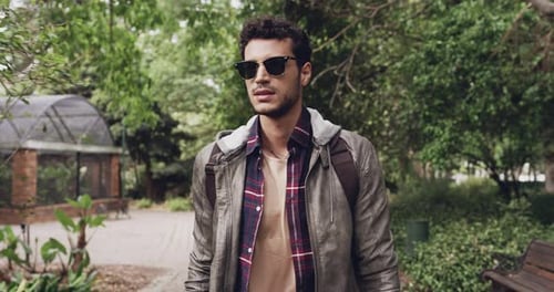 4k video footage of a young handsome man commuting in the city