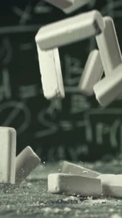 School Chalk Falls on the Desk Filmed on a Highspeed Camera at 1000 Fps