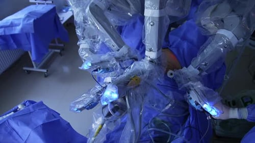Surgeon Performing Robotic Surgery in Operating Room
