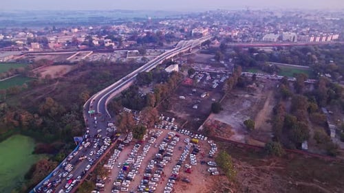 Traffic jam in ayodhya dham road with Tedhi Bazar Railway Overbridge at day time, push in, drone sho