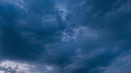 Dramatic Time-Lapse of Blue Clouds Moving Quickly