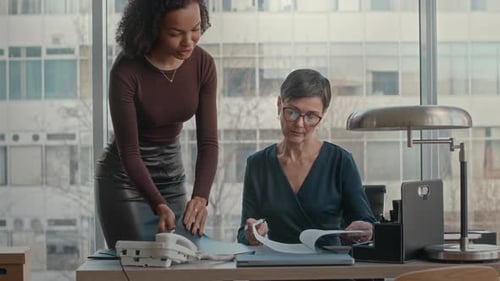 Secretary Bringing Folder with Documents to Lady Boss