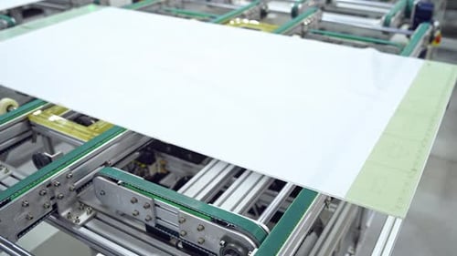 Automated device for making solar panels.